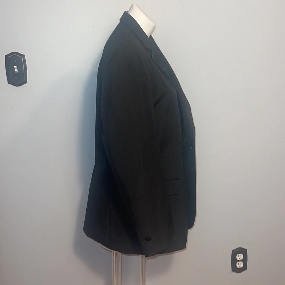 Formal Fashions men’s black tuxedo jacket and pants. Jacket 38S, Pants 34x34